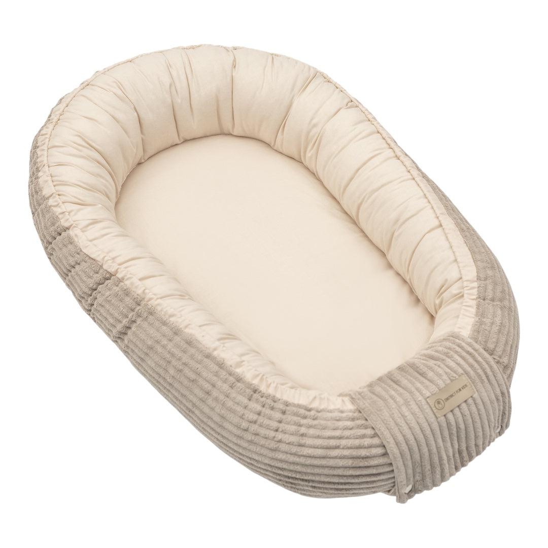 Babynestchen Cord  – Mitwachsender weicher Baby-Kokon